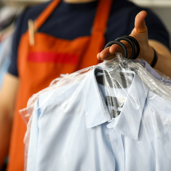 Dry Cleaning Being Hander Over 600X600